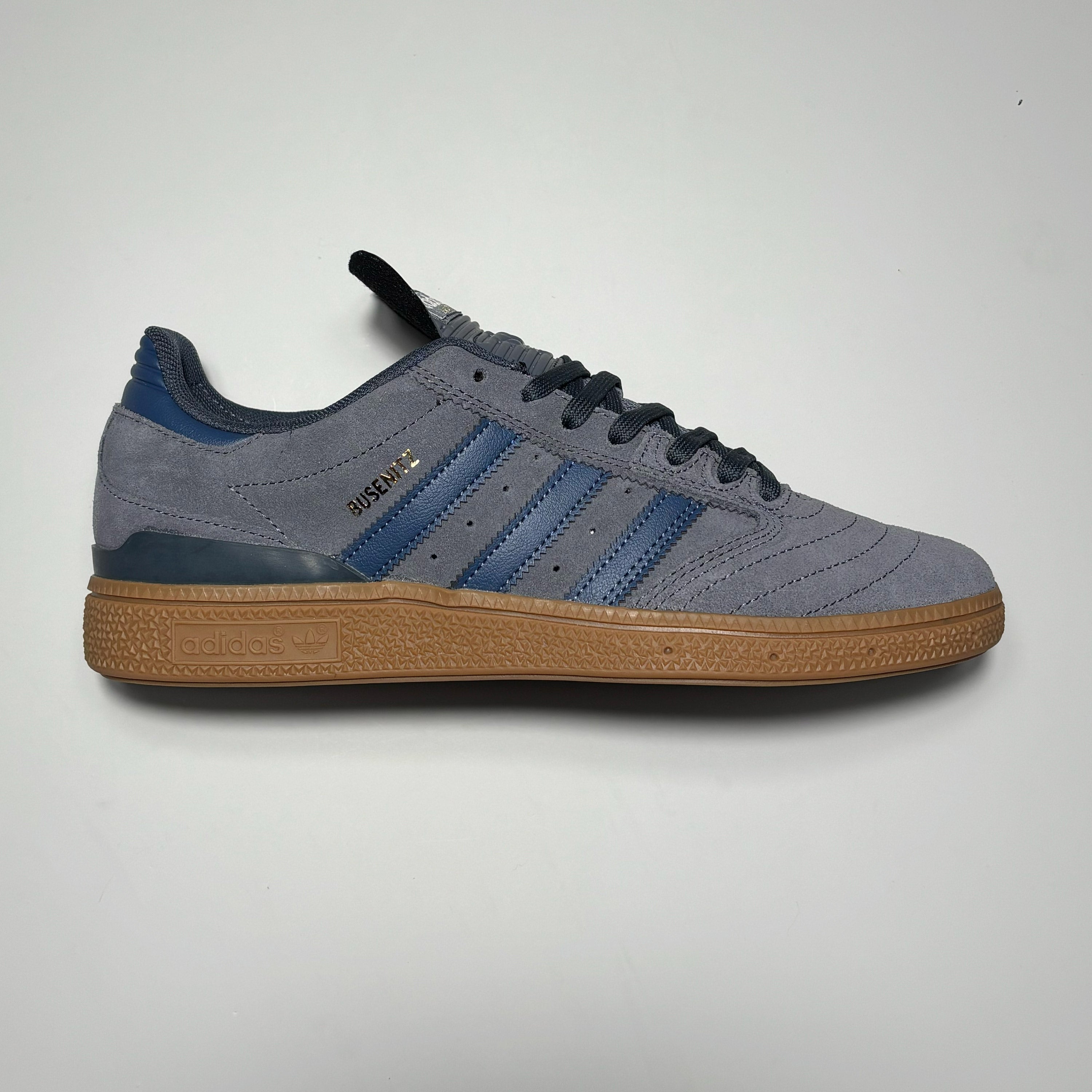 Side image of right shoe. Onix suede with gum outsole.