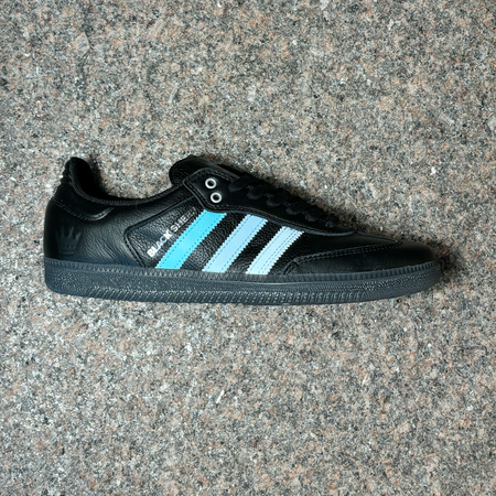 SIDE PROFILE PHOTO OF RIGHT SHOE. BLACK LEATHER WITH BLUE TO WHITE FADED STRIPES