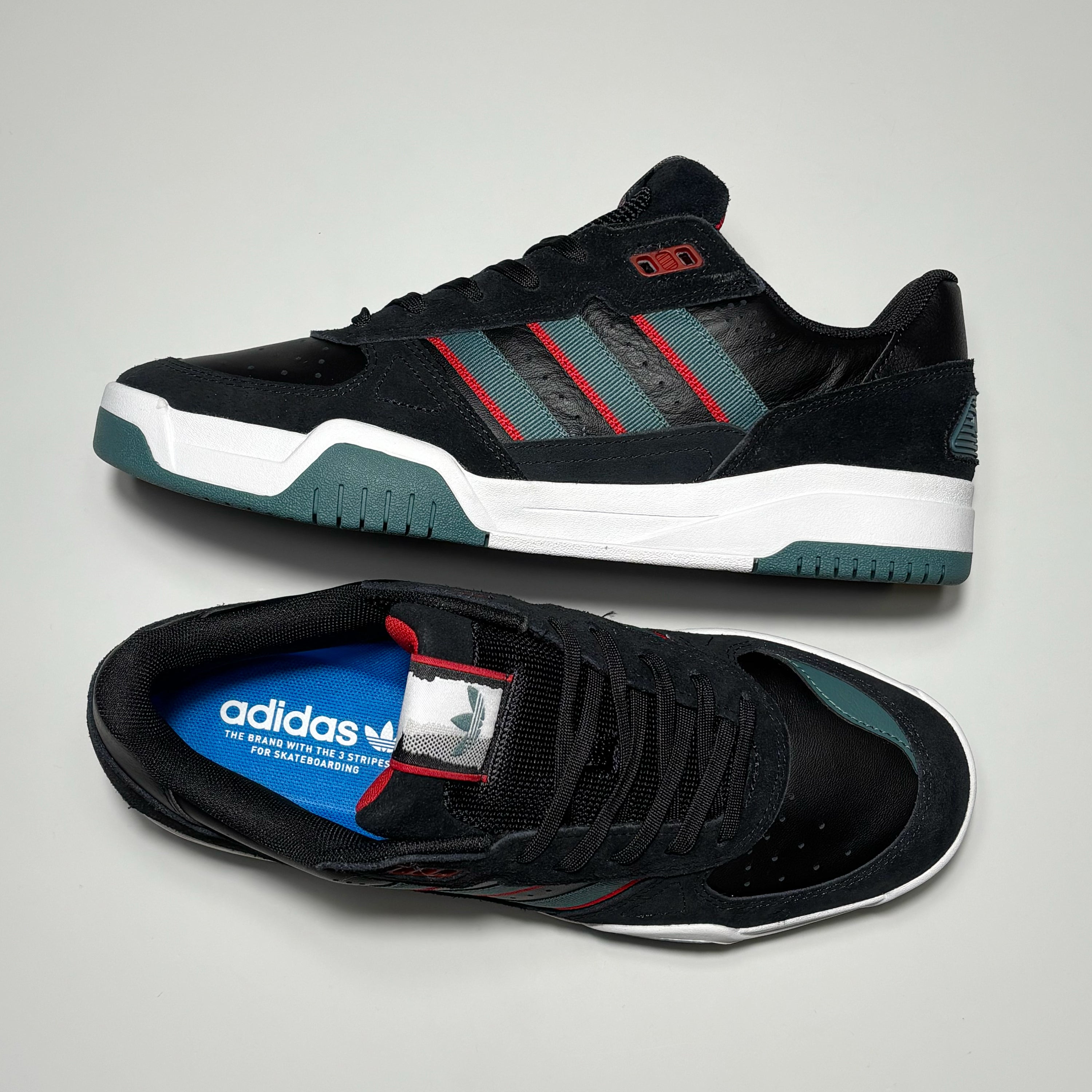 Toe down view with side profile. 
Mesh tongue and adidas label