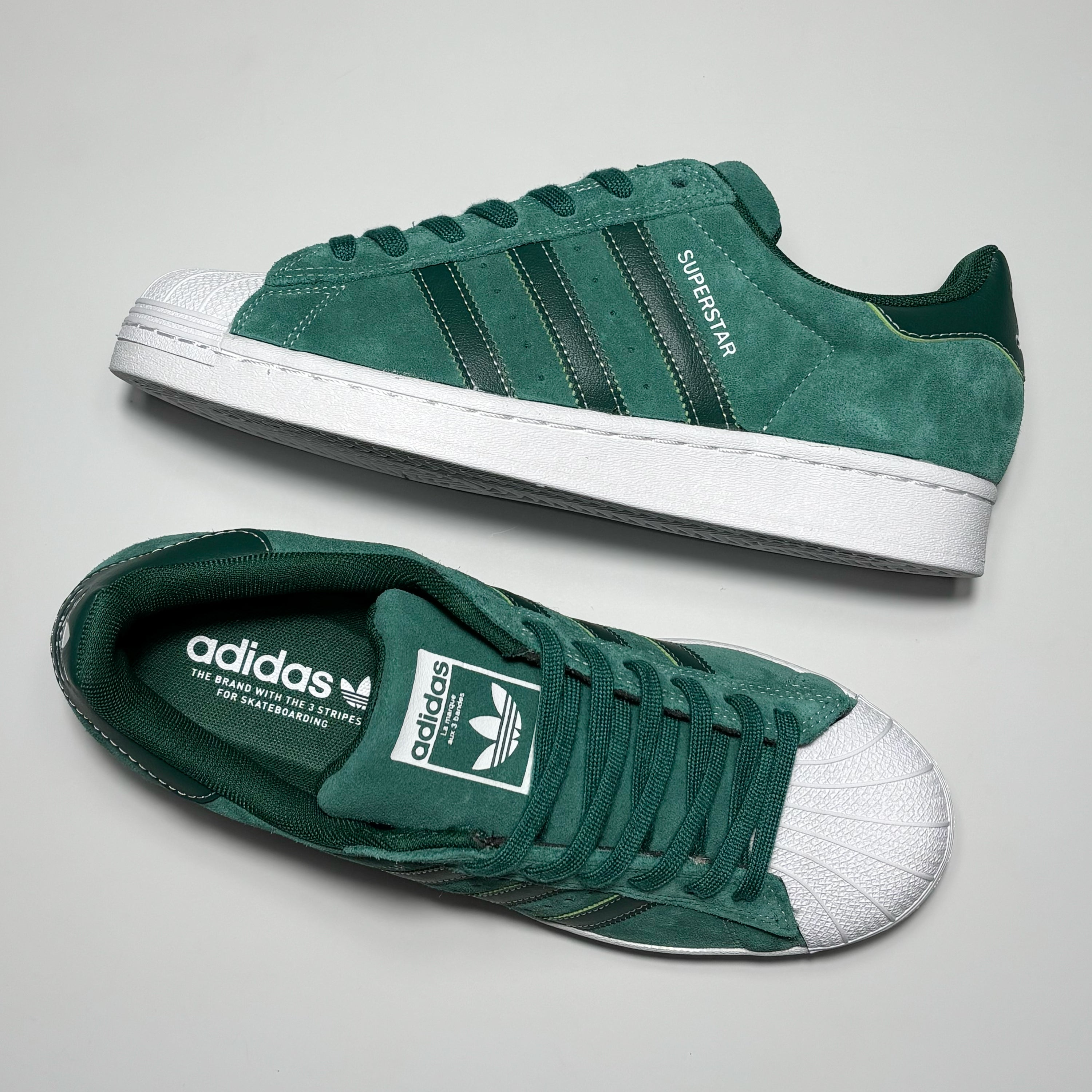 Toe down view with side profile.
Adidas branding on tongue.