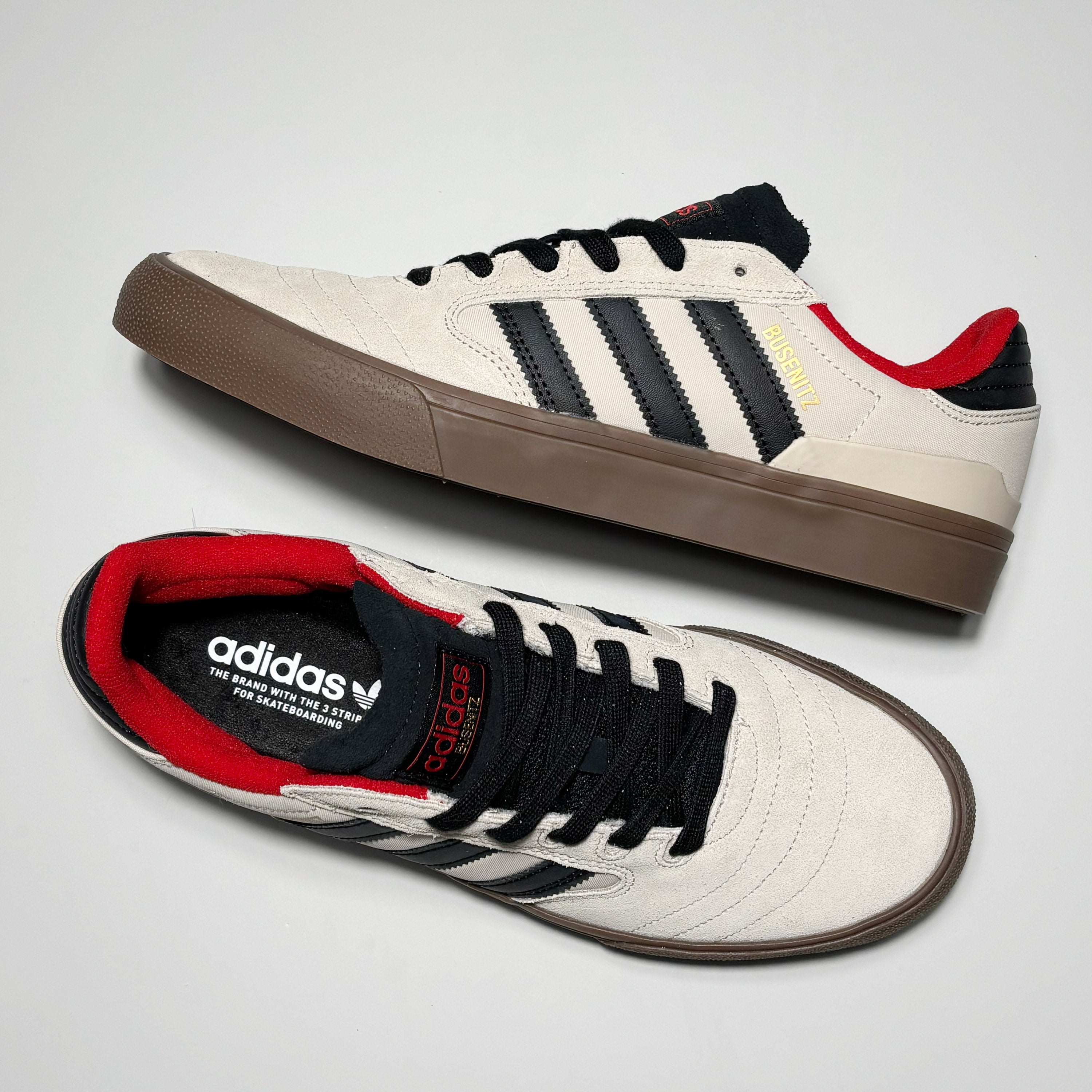 Toe down view with side profile.
Woven label on tongue.