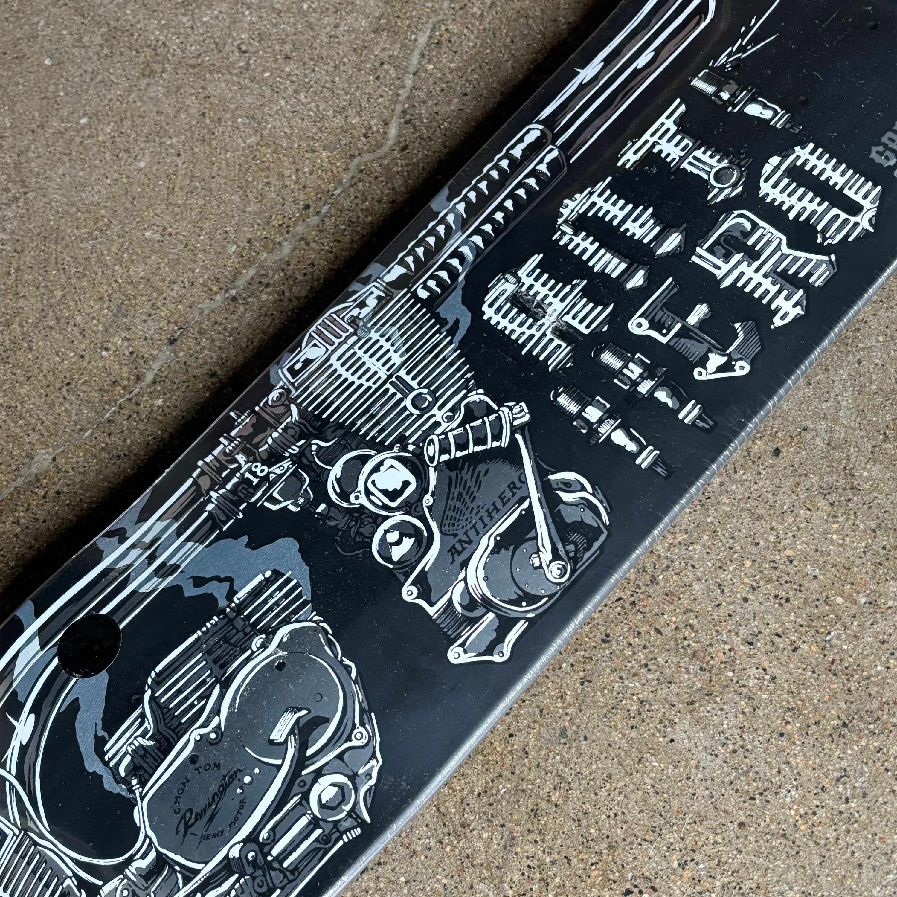 Black and white motorcycle design on a textured surface