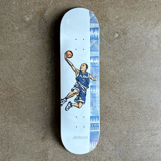Full image of Album Skateboards deck with cartoon art of a basketball player doing a slam dunk