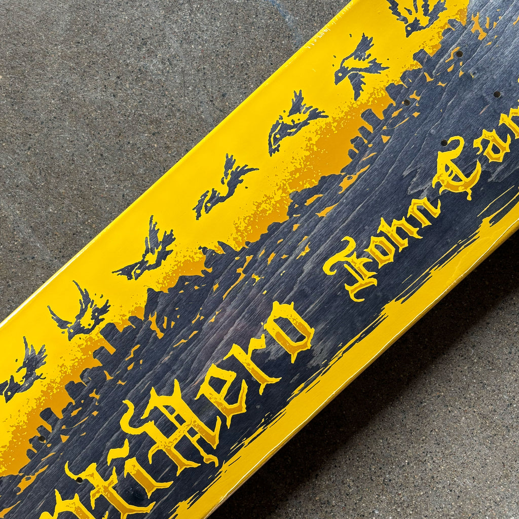 Close detail of exposed veneer with yellow art.