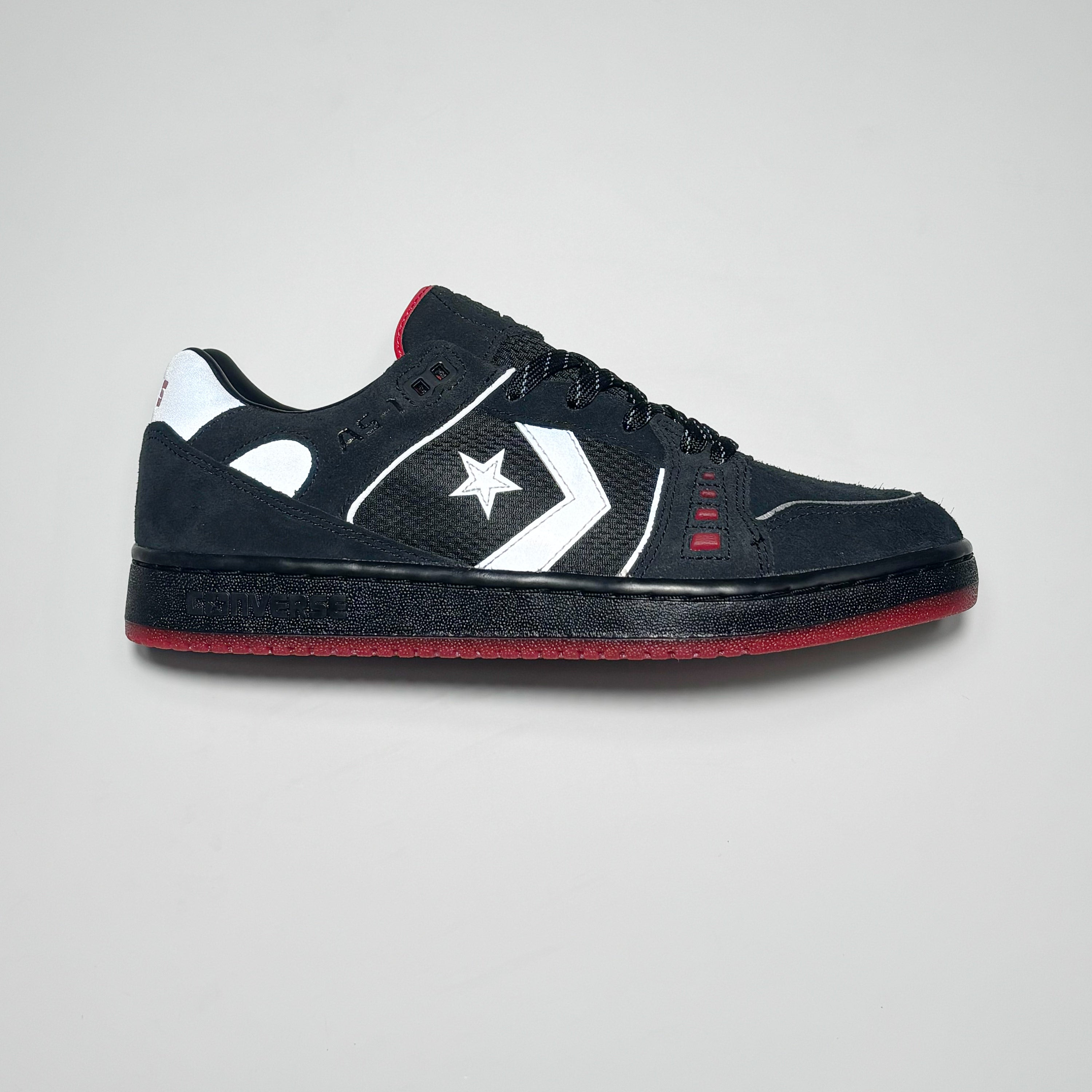 Black suede with 3m reflective logo and red outsole.