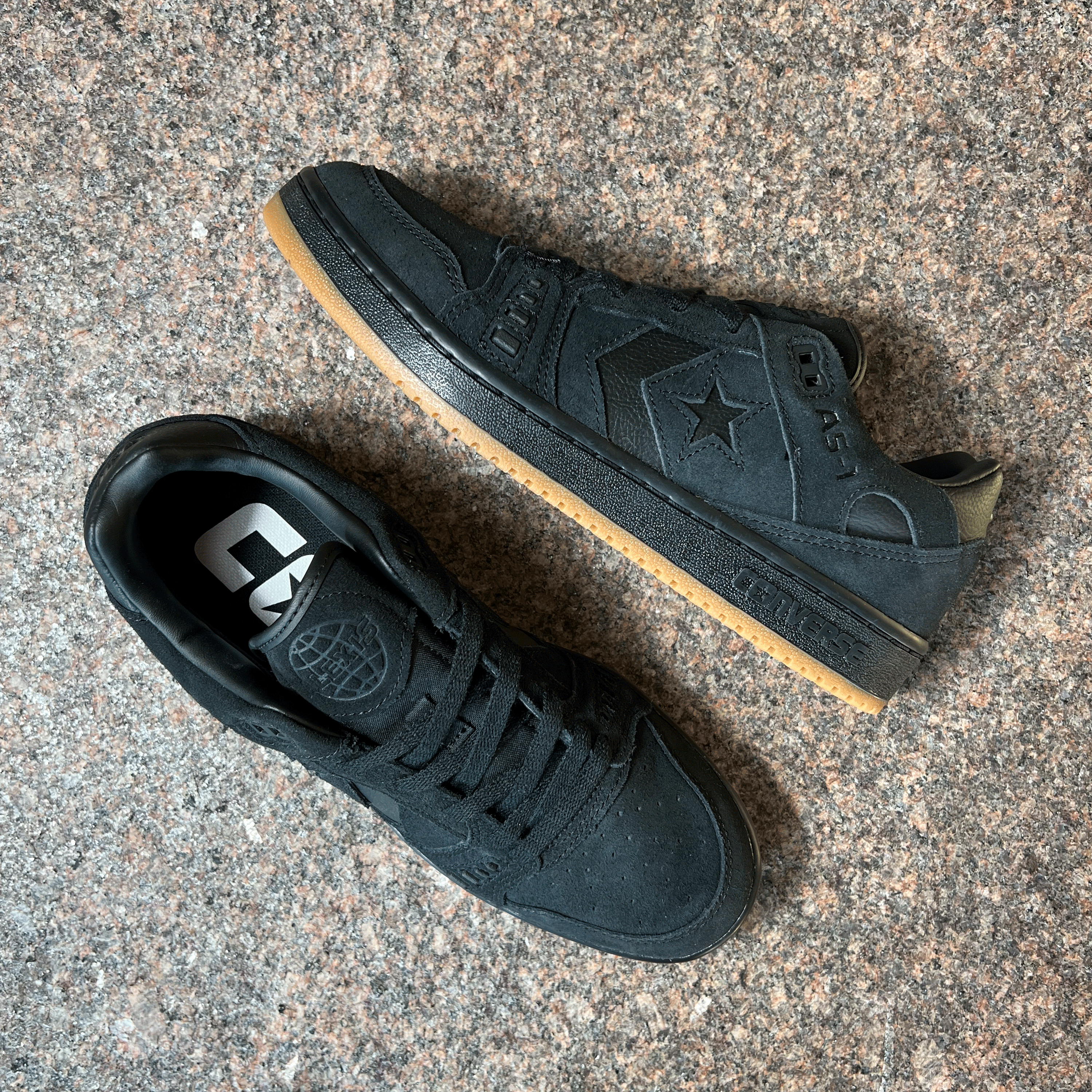 CONVERSE CONS AS-1 SHOES IN BLACK SUEDE WITH A BLACK AND GUM SOLE DISPLAYED ON GRANITE