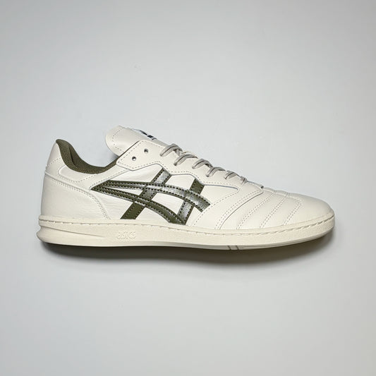 Right side image, Asics Skateboarding Leggerezza shoes. Cream leather with green branding. 