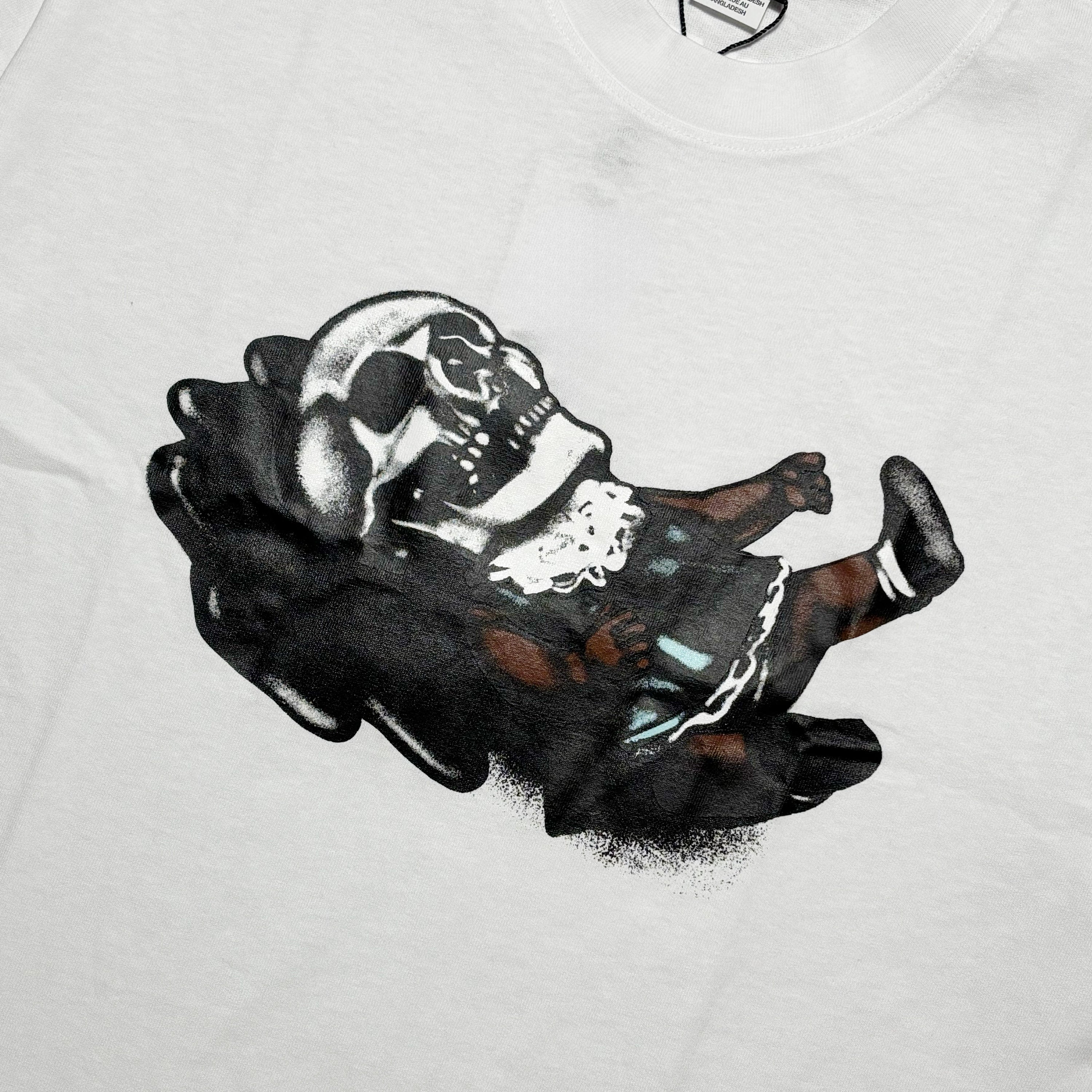 Close detail of art on chest.