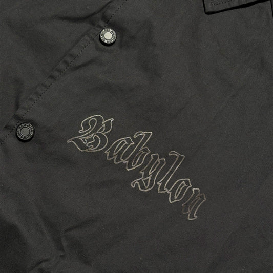 Close detail of babylon printed on chest