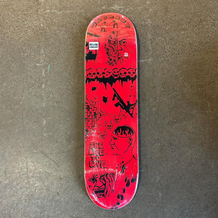 Full image of deck. Red background with black raised artwork.