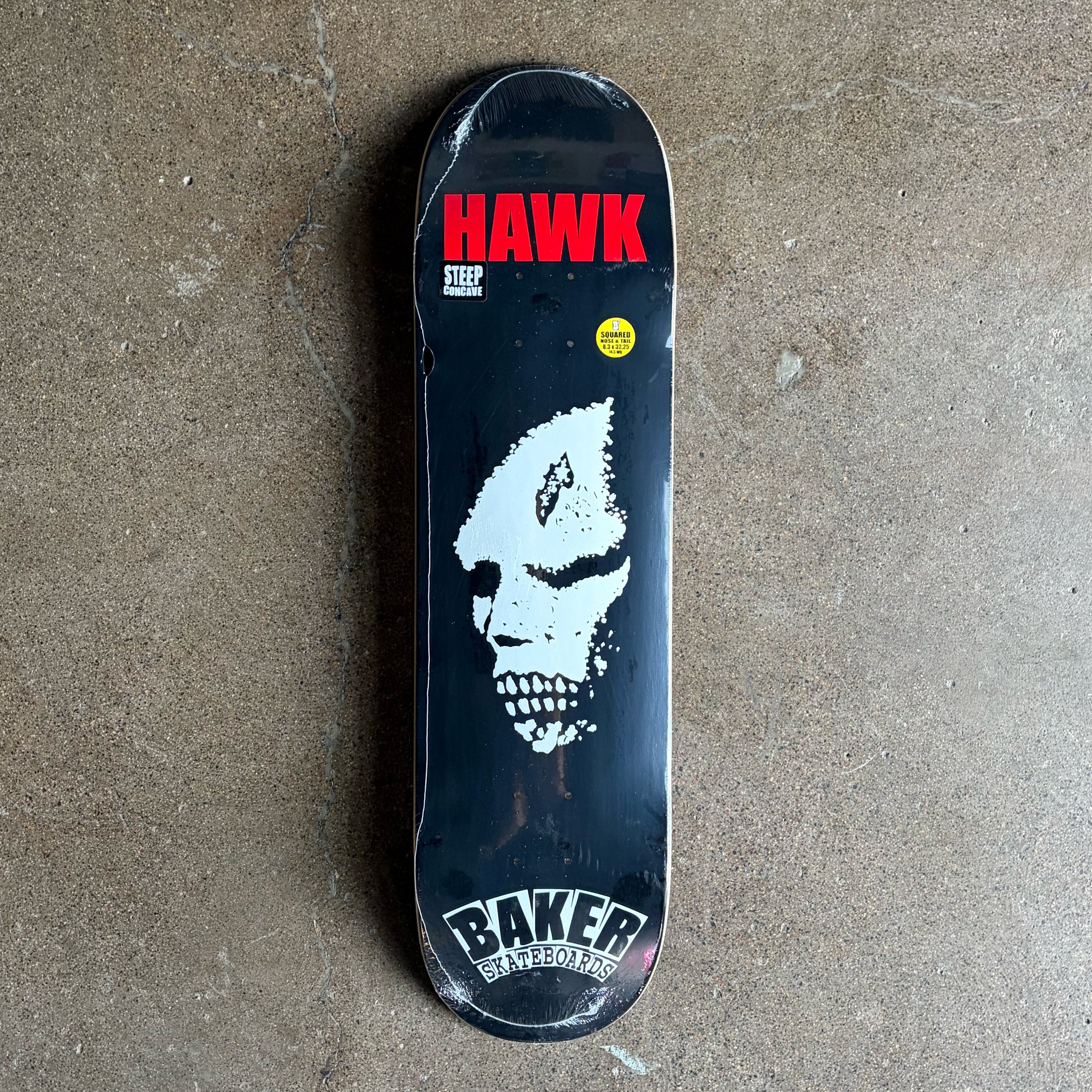 Full image of deck, white evil face on black background skateboard