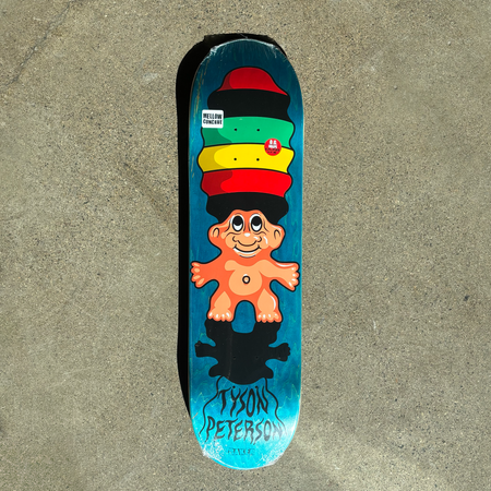 Full image of deck. Troll artwork with a rasta stacked hat