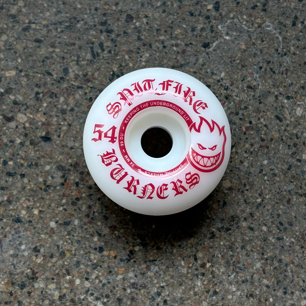 Image of white wheel with red artwork.