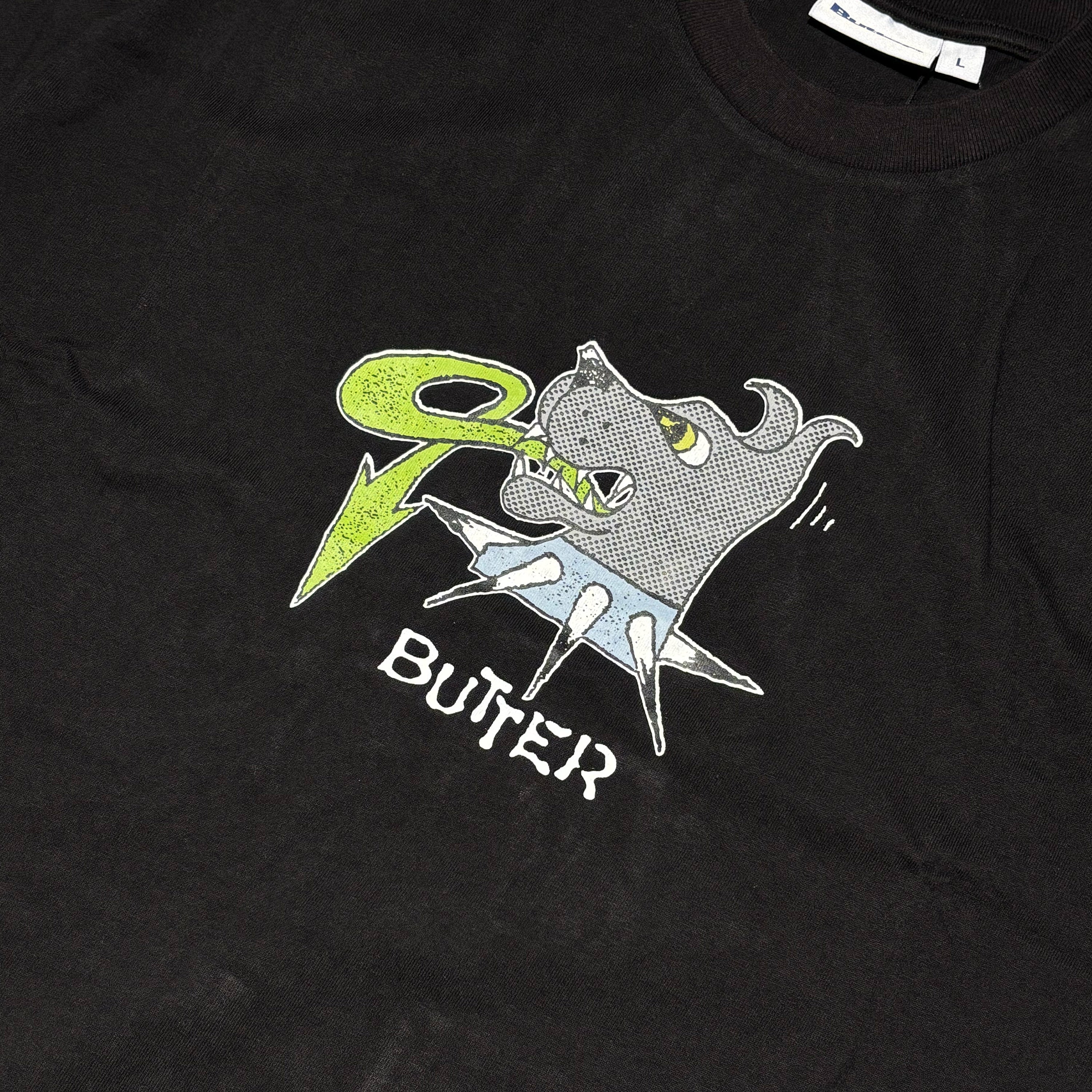 Close detail of art printed on chest.