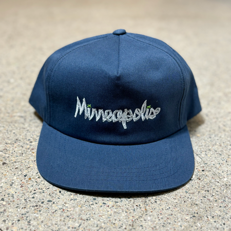 Front image of navy hat with Minneapolis embroidered on crown.