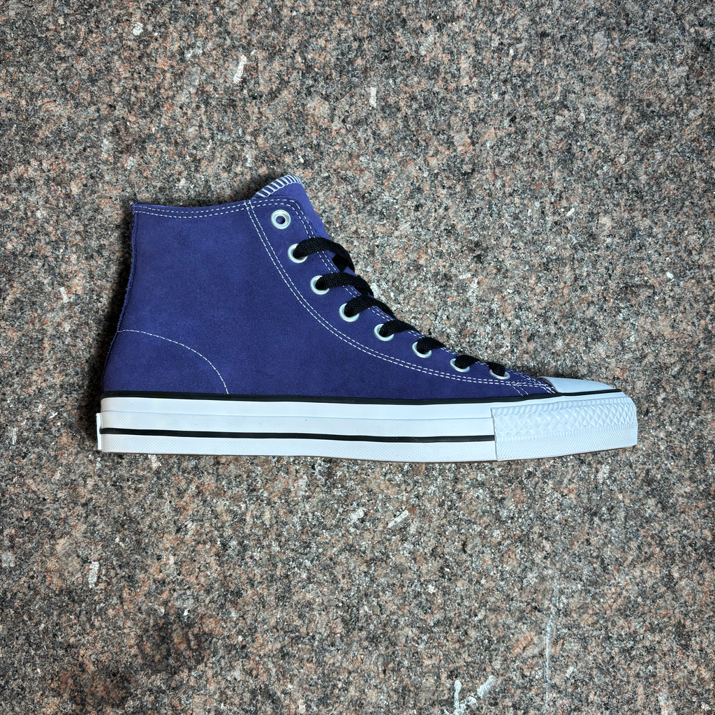 Full side view of right shoe.
Blue suede with black laces and white midsole.