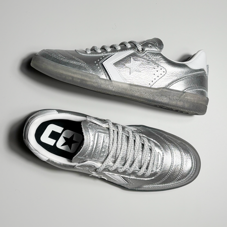 Toe down view with side profile. 3m woven laces with embossed cons logo on tongue. 