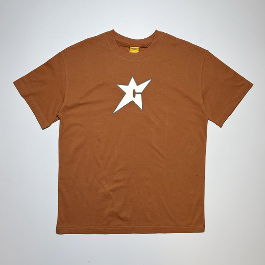 Front image of brown tee with C-stat logo printed with glow in the dark ink on chest. 
Carpet Company Season 22