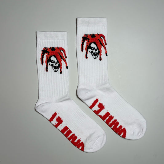 Pair of Carpet Company Season 22 Jester Socks in white.