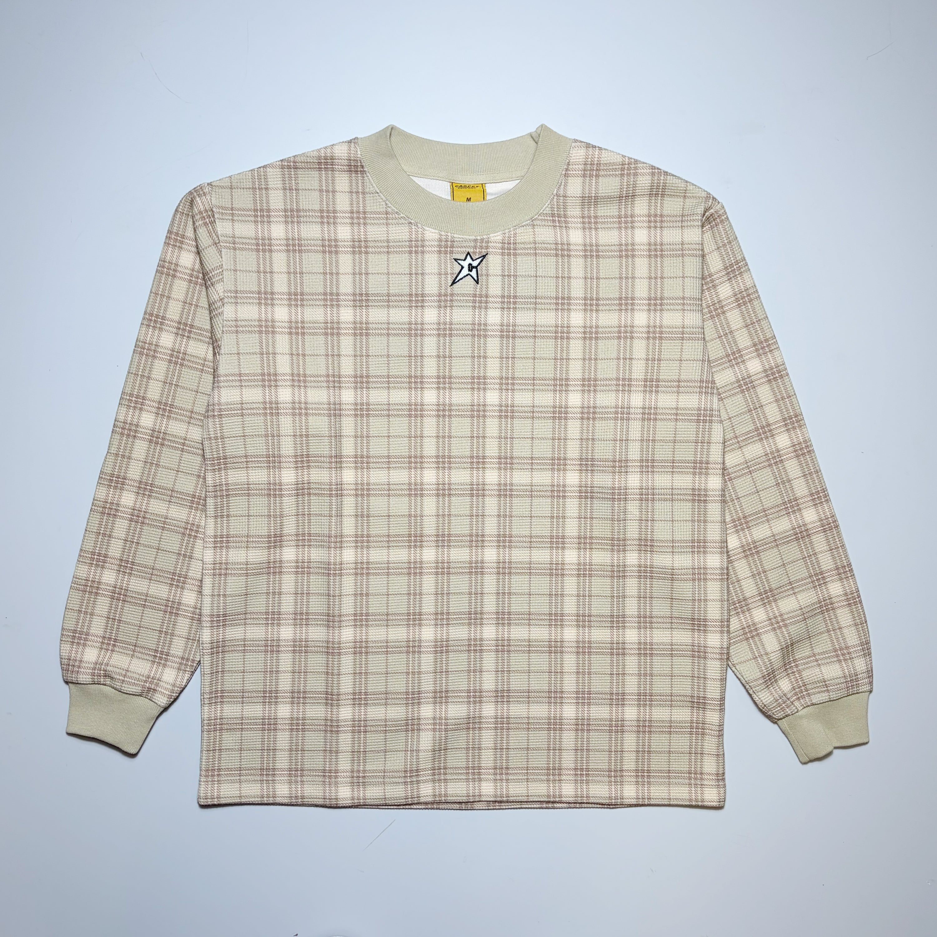 Full front image of plaid printed thermal. Carpet Company Season 22 cut-n-sew with embroidered C-star logo below neck.
