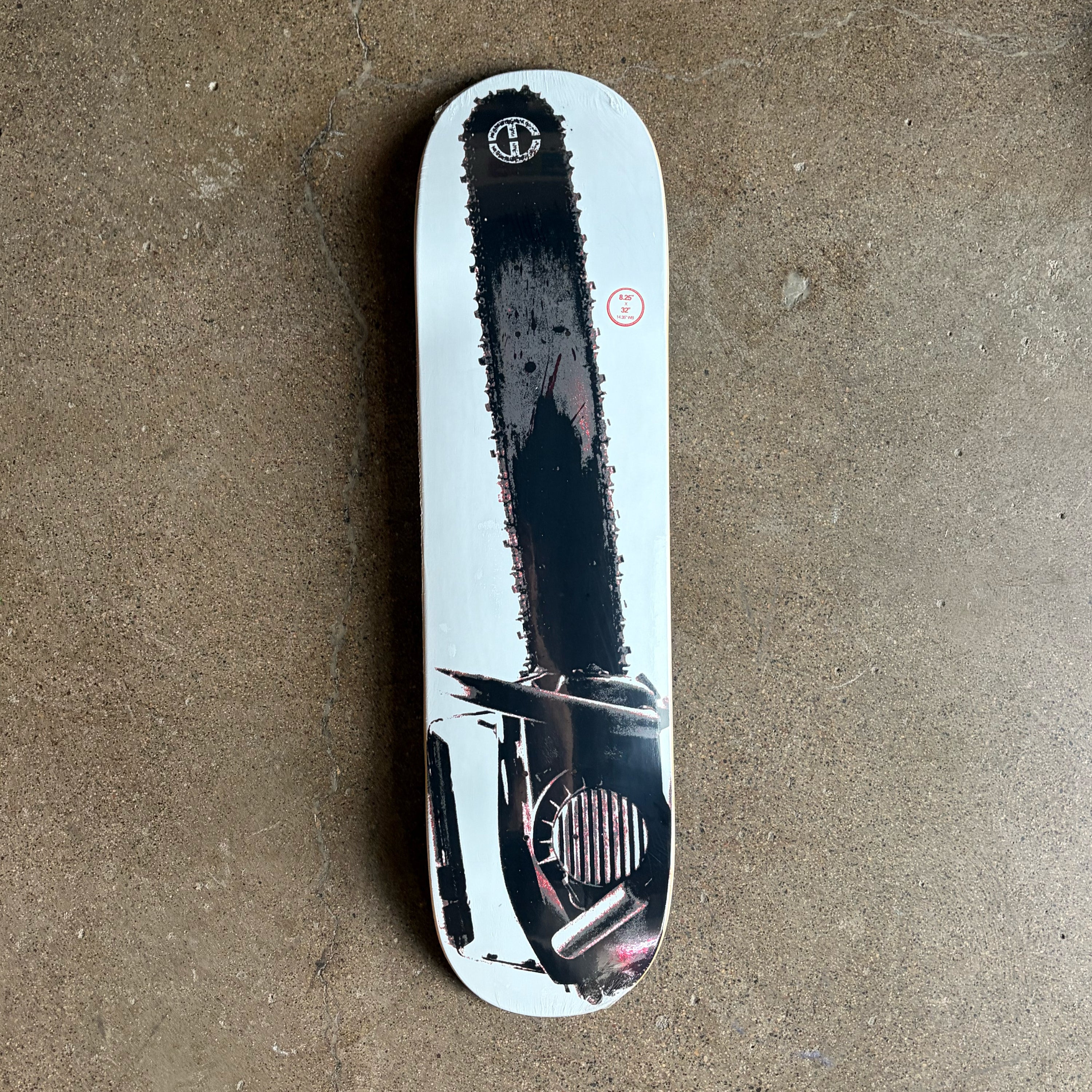 Full image of skateboard deck, photo of chainsaw on a white background skateboard