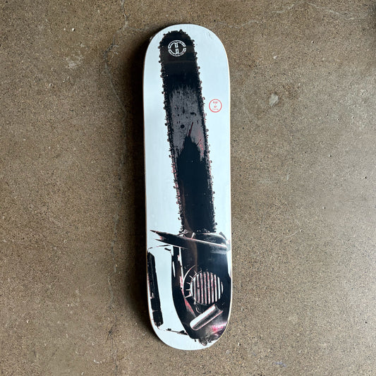 Full image of skateboard deck, photo of chainsaw on a white background skateboard