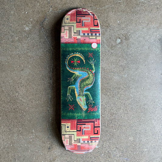 Full image of skateboard deck, woven carpet textile inspired art 