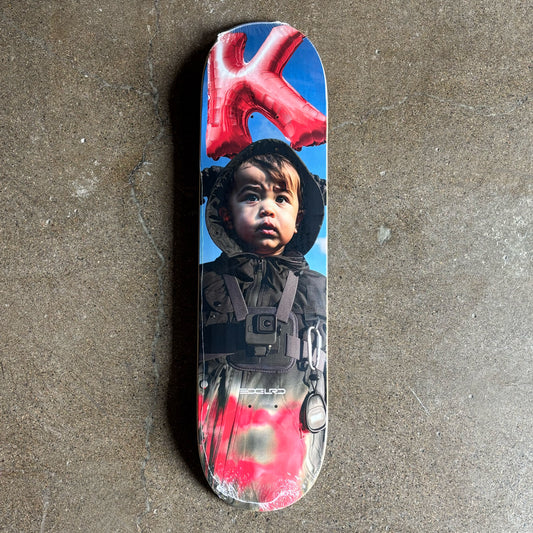 Full image of deck with a printed design of a child wearing a hooded jacket on.