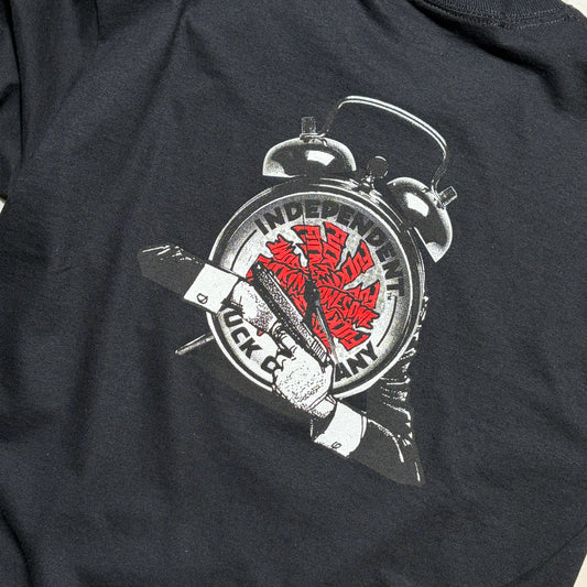 Close-up of a printed graphic print of a silver alarm clock with fucking awesome text on the face, and the words 'INDEPENDENT TRUCK COMPANY' printed on it.
