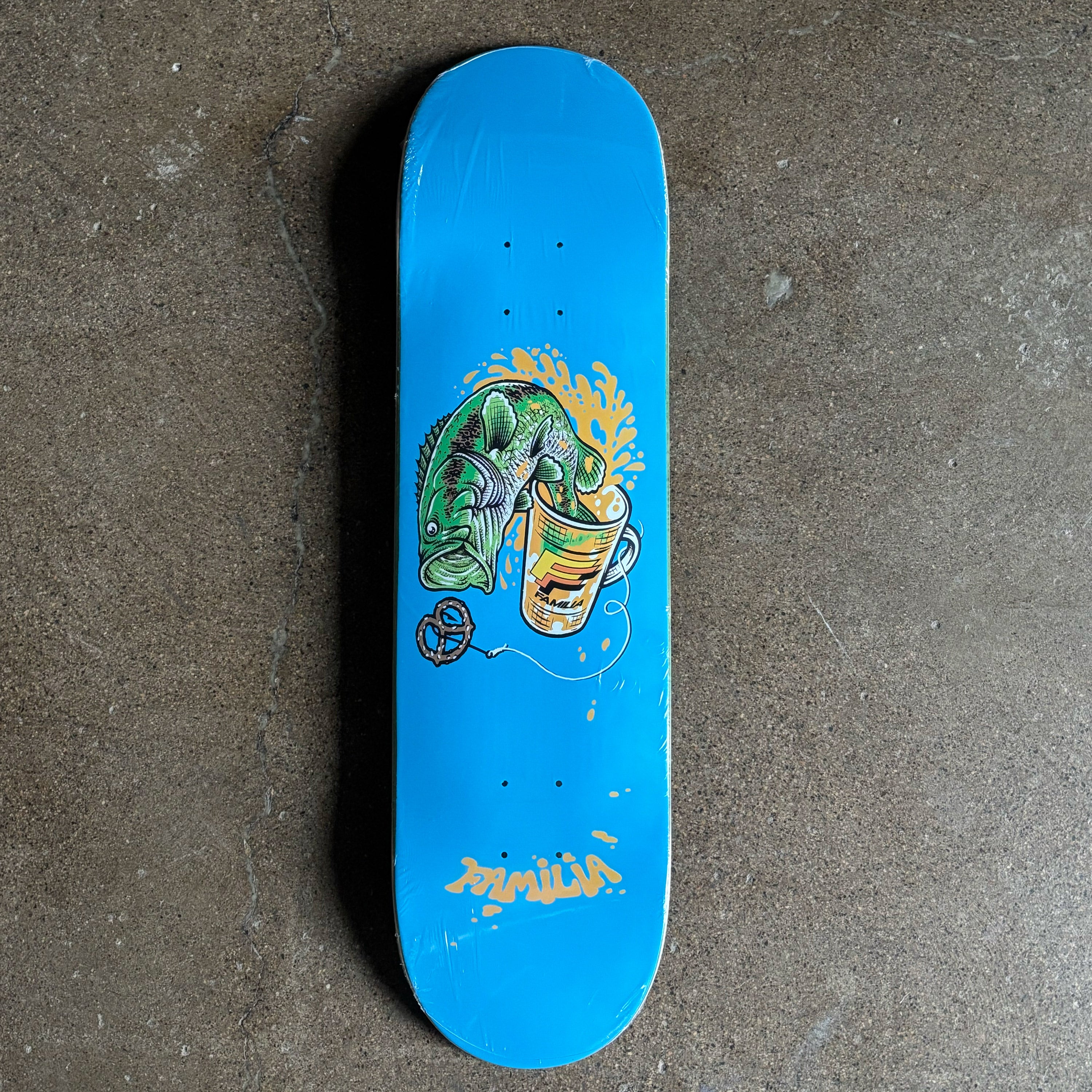 Full image of blue deck. Bass fish artwork jumping out of a beer glass.