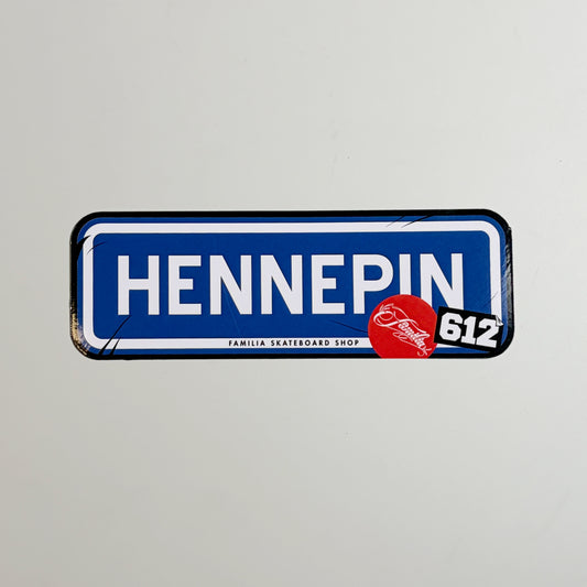 Image of blue vinyl sticker. Hennepin text in white on blue background.