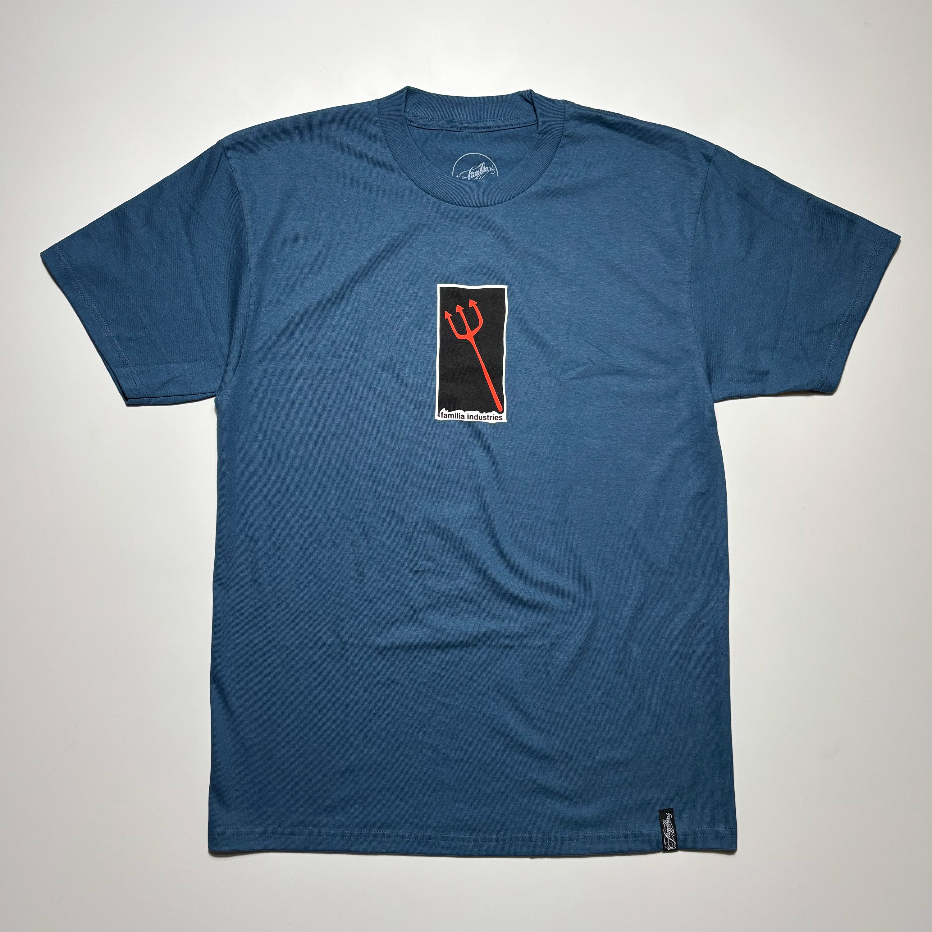 Front image of dark blue tee with art printed on chest.
