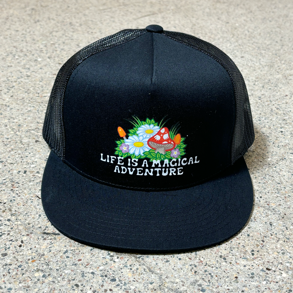 Front image of black mesh hat. Printed mushroom/flower art with 