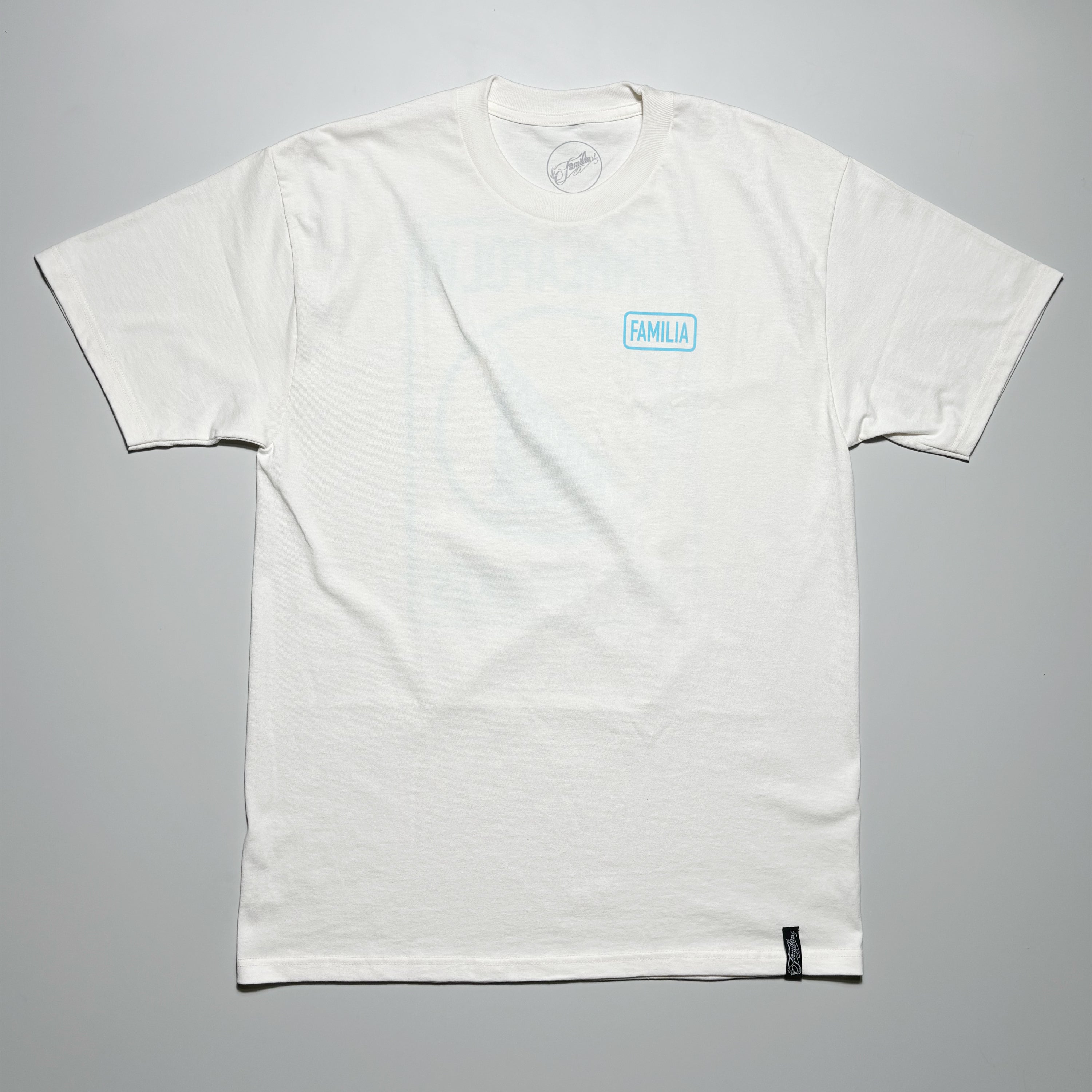 Front image of white tee with blue printed art on chest. 