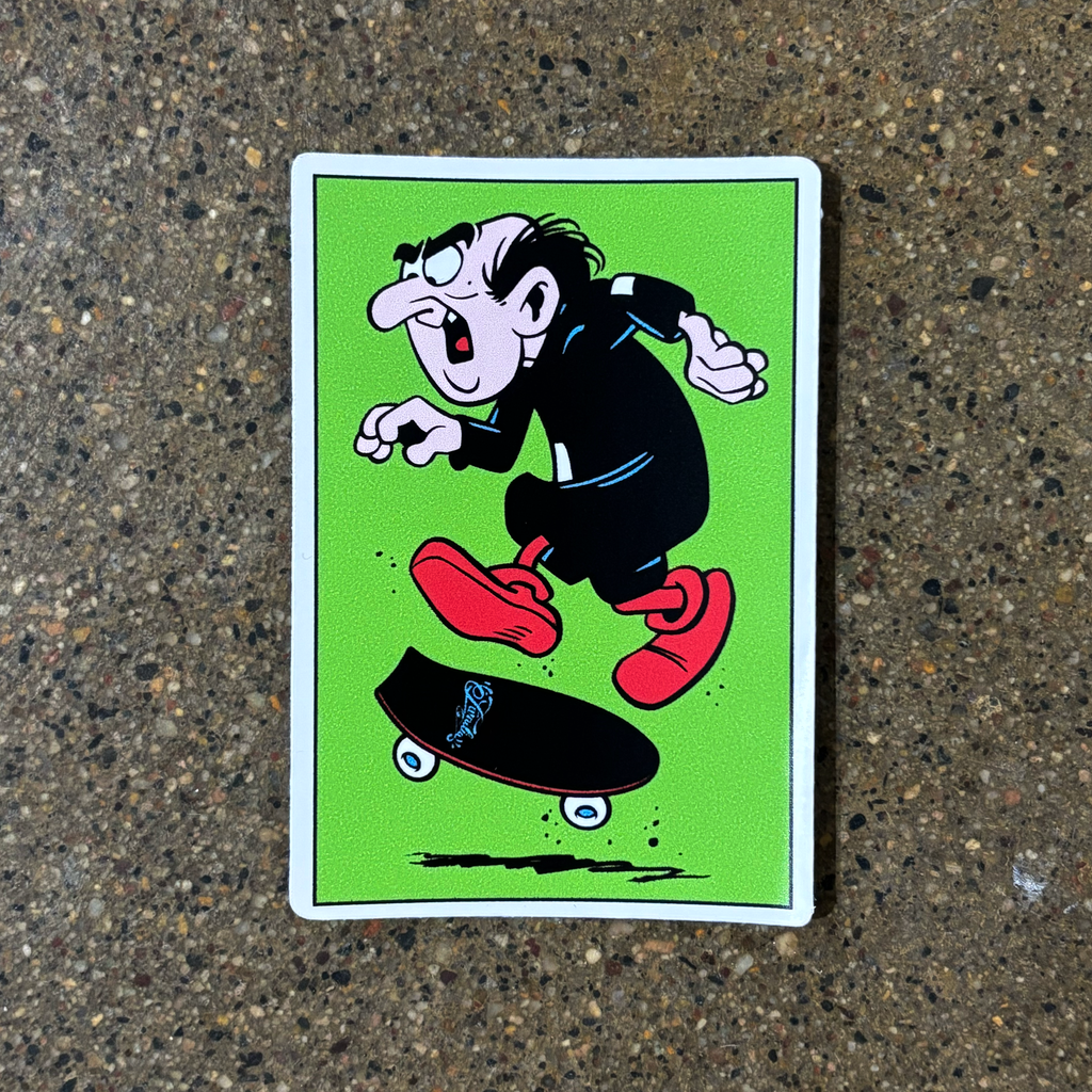 Full image of green vinyl sticker. Gargamel doing a tre flip art. 