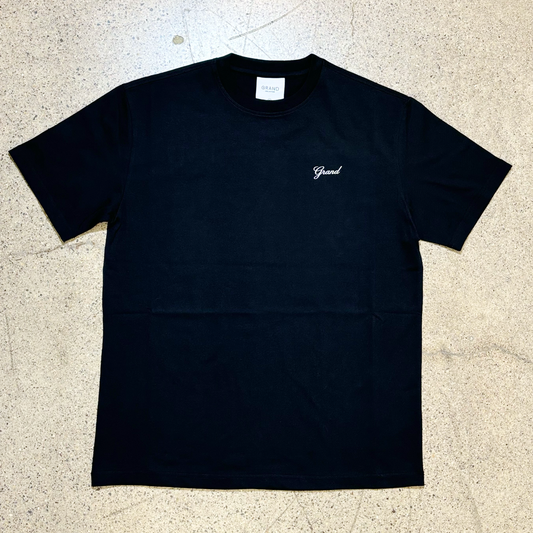BLACK T-SHIRT, GRAPHIC IN CURSIVE FONT THAT READS GRAND ON LEFT CHEST