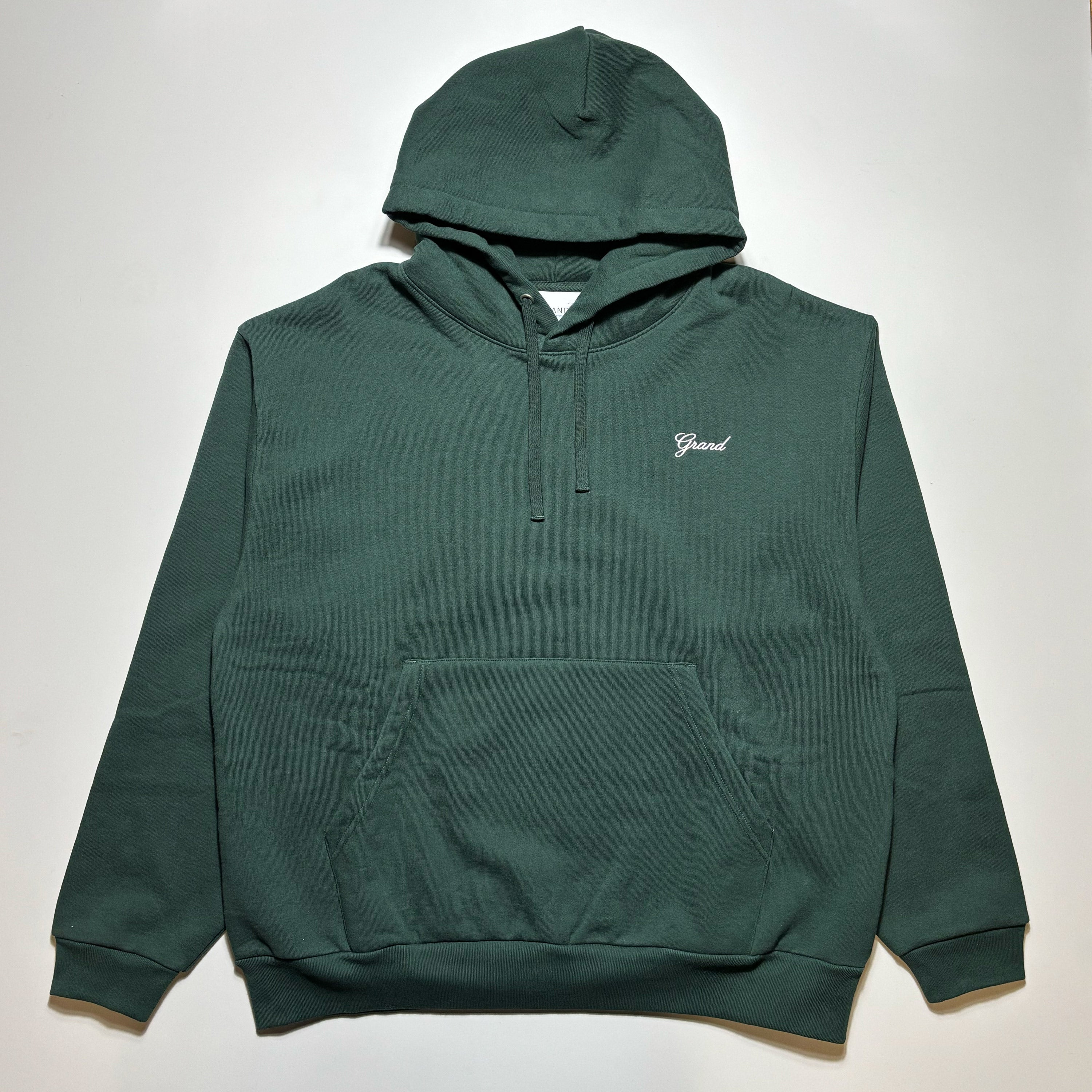 Full image of forest green hoodie with embroidered logo on chest.