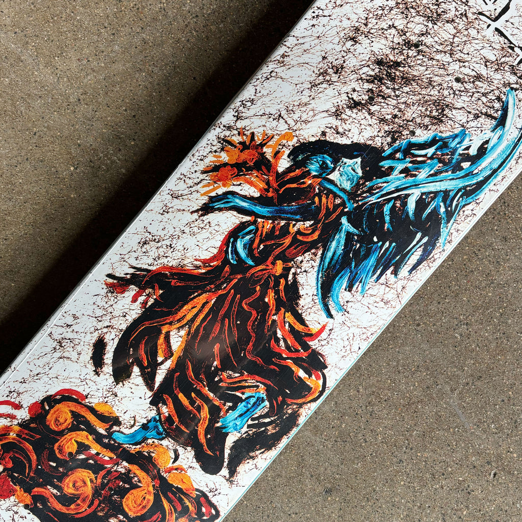 Close detail of chaos artwork in orange/blue