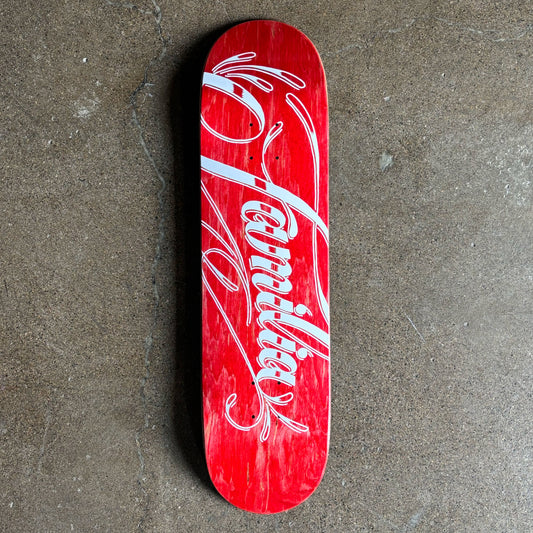 Full image of red veneer stained deck with white script across bottom.