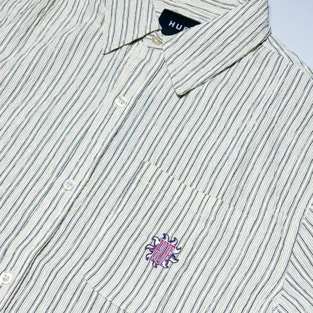Close detail of embroidered logo on pocket.