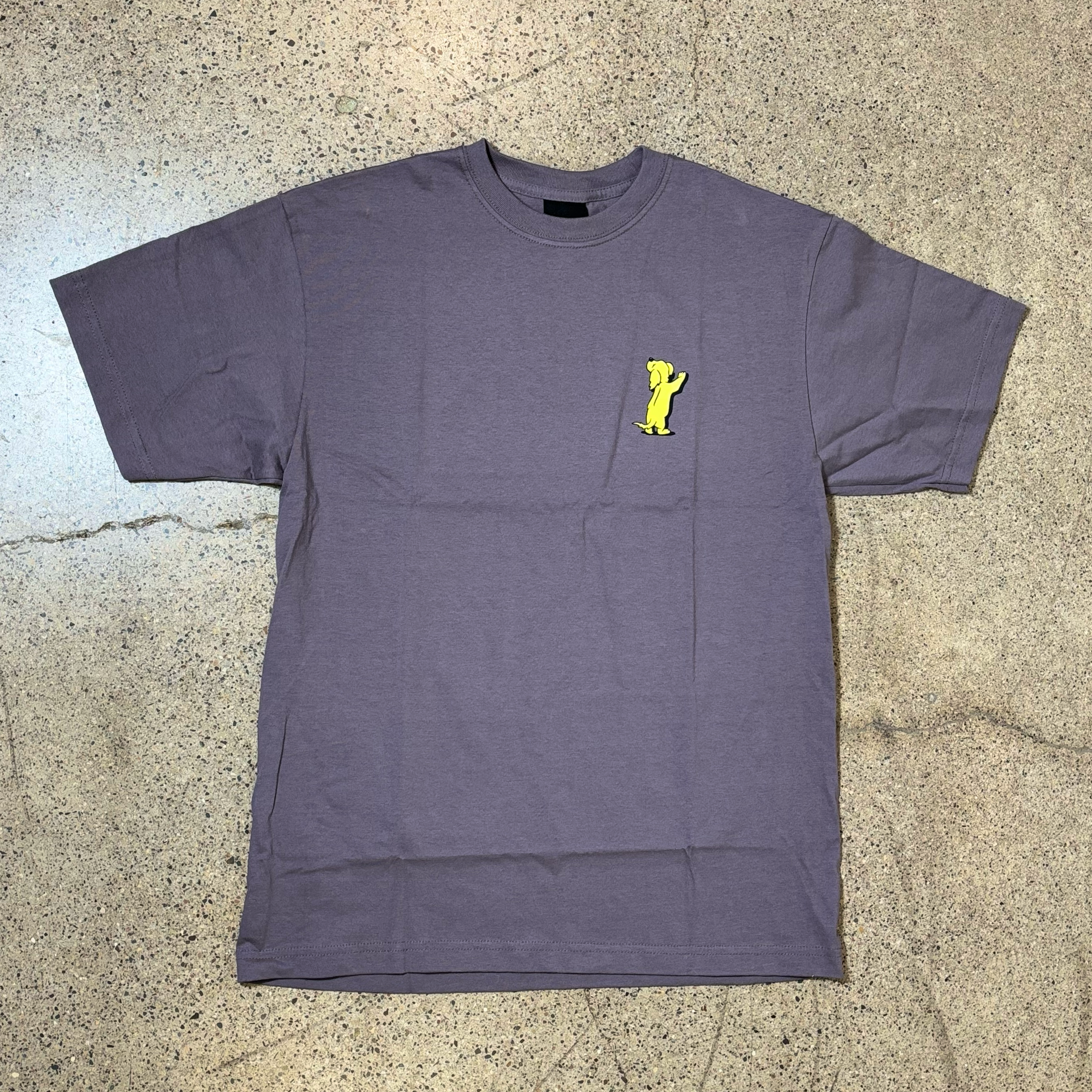 Front image of plum color tee.
Yellow printed dog on front