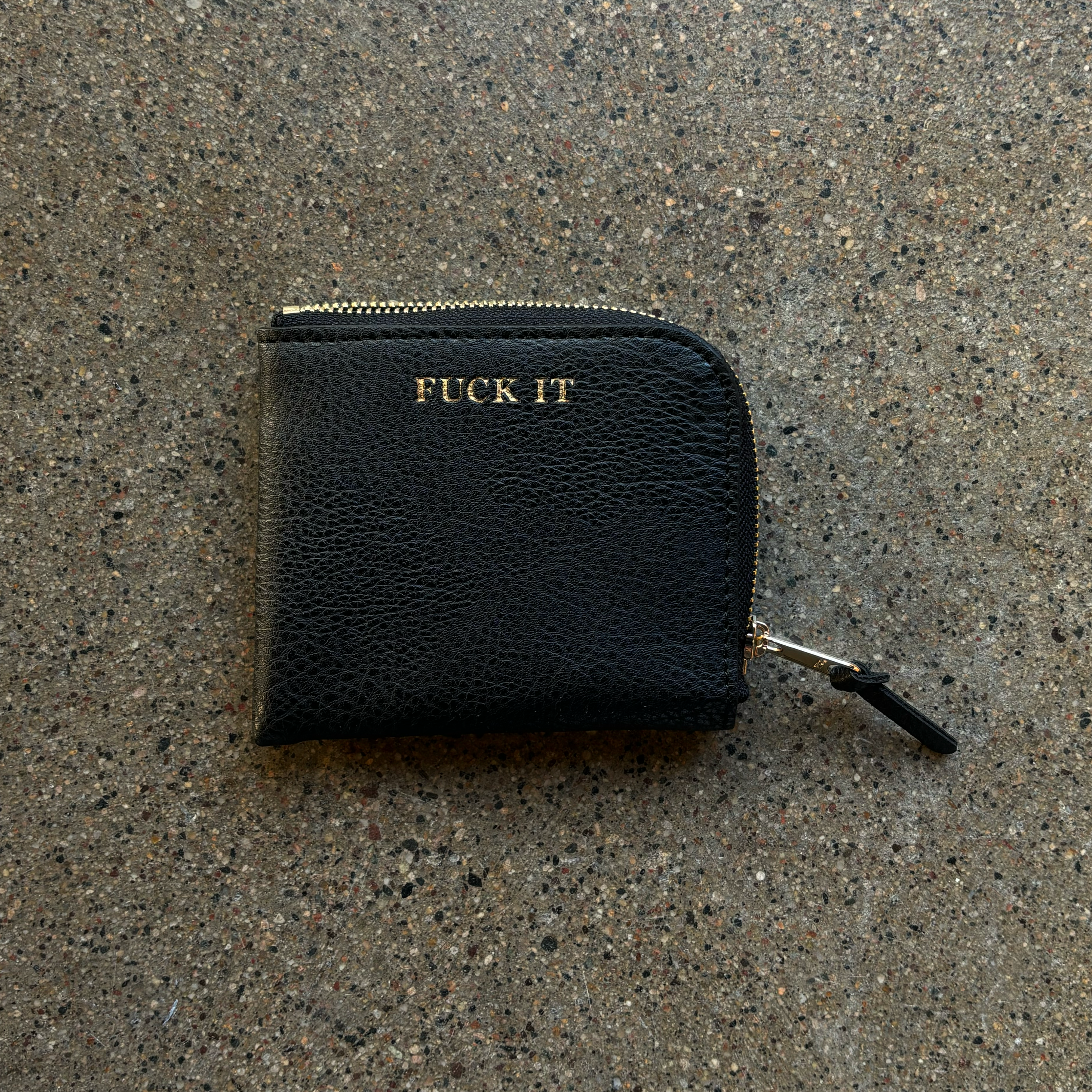 Image of leather wallet. Embossed 