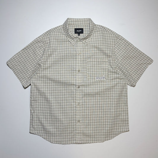 Full image of HUF Galaxy Plaid woven shirt. Embroidered HUF logo on pocket.