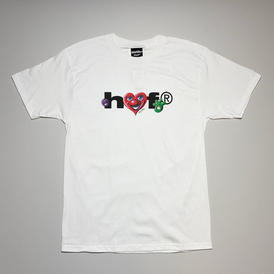 Full front image of white HUF Kenny Scharf Future tee. Airbrush inspired art printed on front.