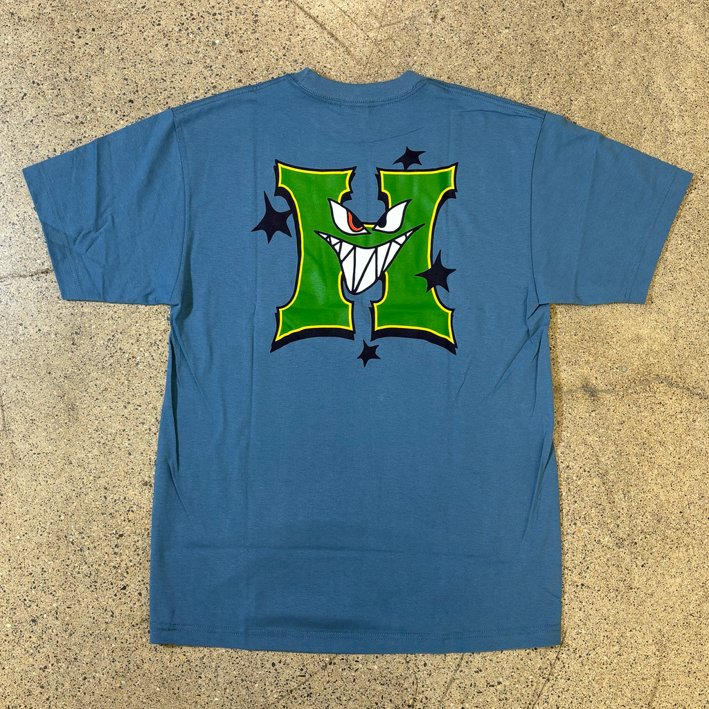 BACK SIDE BLUE T-SHIRT, DRAWING GRAPHIC OF GREEN CARTOON H WITH EYES AND MOUTH