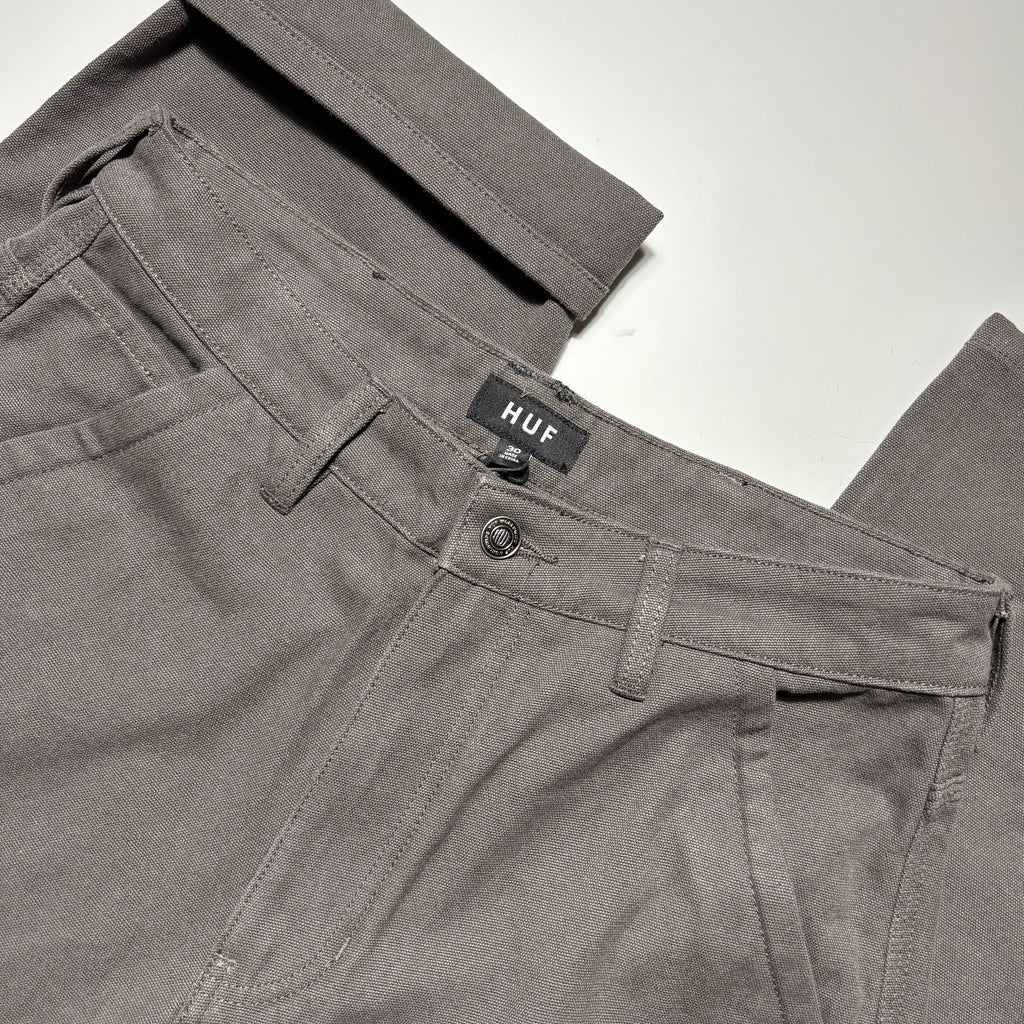 Close detail of side cut pockets and custom button.