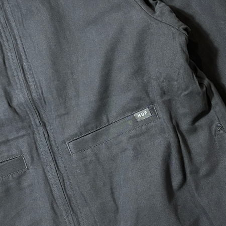 Close detail of canvas side with huf woven label on top