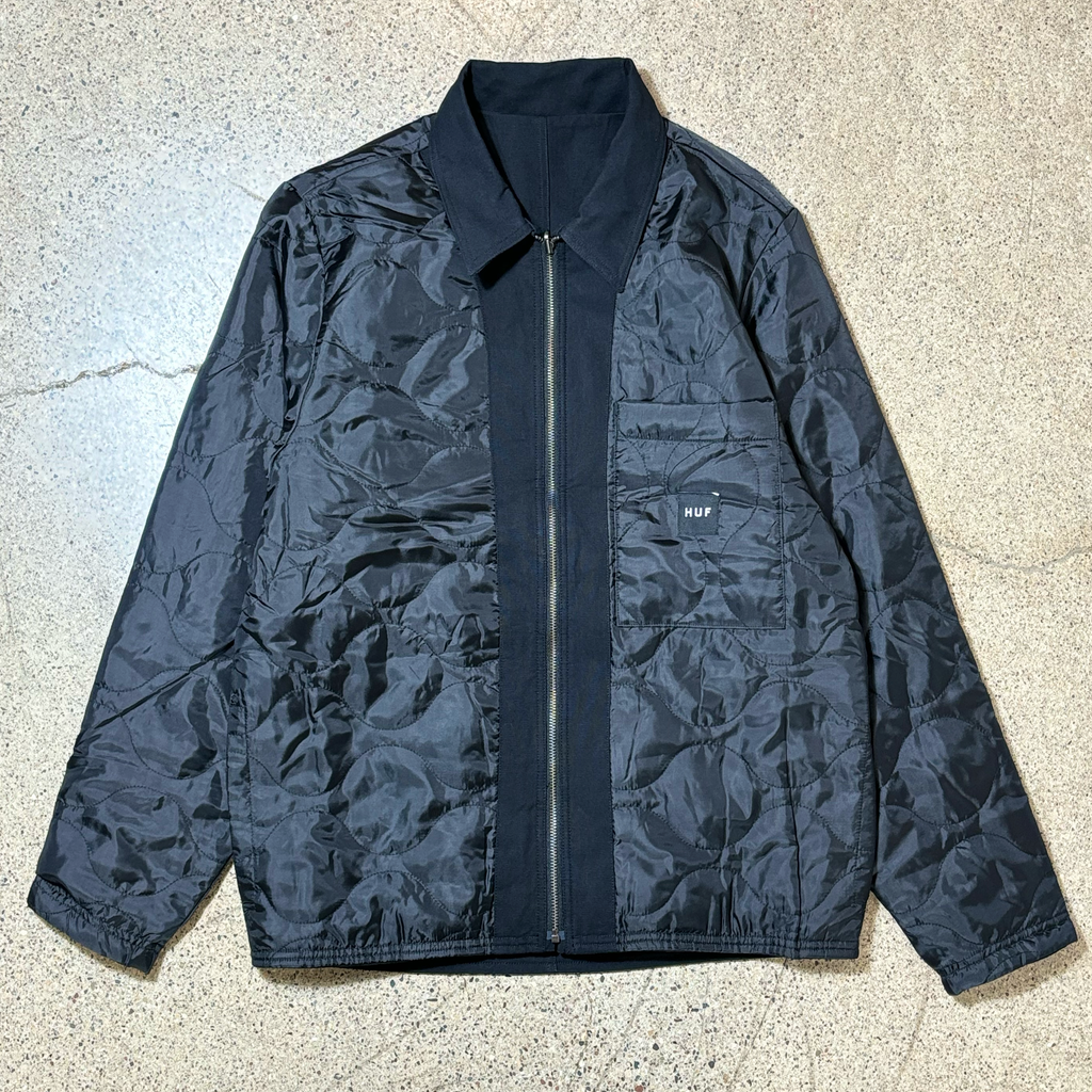 Full image of jacket. Quilted side with chest pocket and HUF woven label.