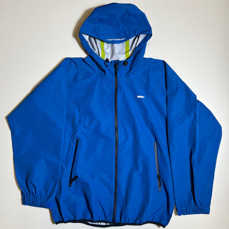 FRONT FACING RAIN JACKET IN BLUE COBALT WITH BACK ZIP UP AND ZIPPER POCKETS. SMALL WHITE HUF LOGO PRINTED ON RIGHT SIDE CHEST. T1-KCUF TECHNOLOGY PRINTED IN WHITE ON THE HOOD