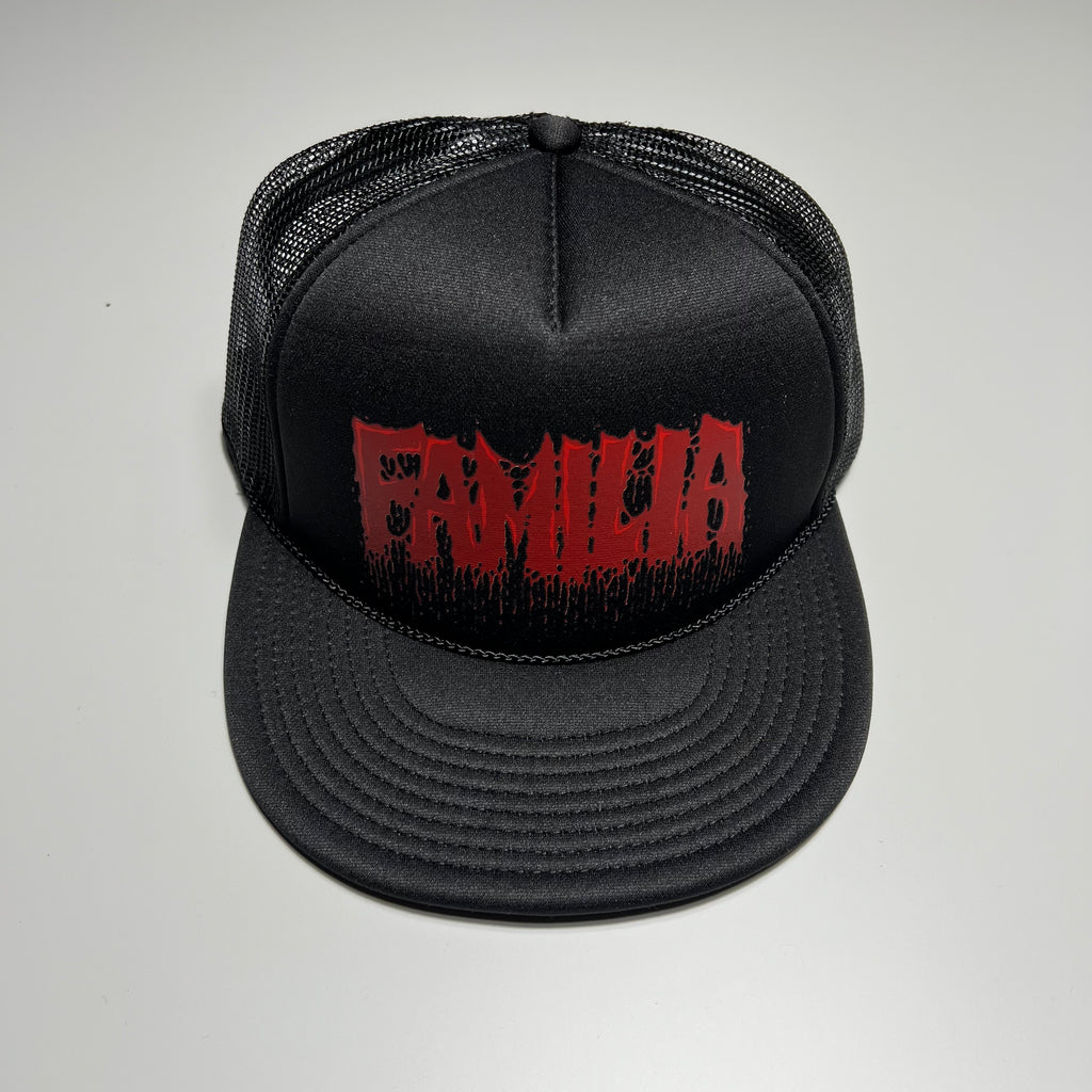 Full image of black hat. Familia font in blood red with drips on crown.